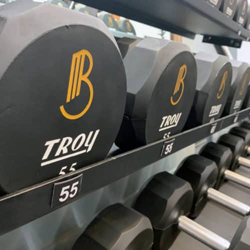 Custom logo dumbbells for Breathe Moore Training | Designed by Field of Study: A branding and graphic design consultancy | Houston TX | Jennifer Blanco & John Earles